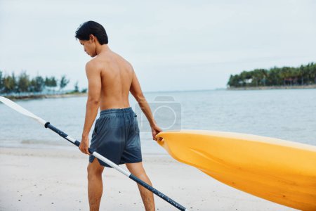 Photo for Sun-Kissed Kayaker Enjoying Tropical Adventures on Beach with Palm Trees and Azure Ocean - Royalty Free Image