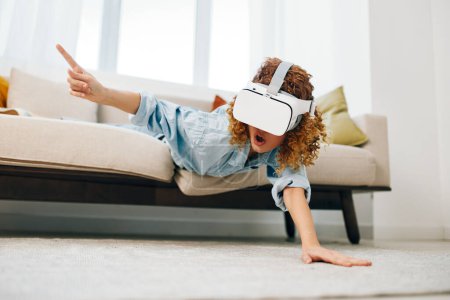 Photo for Virtual Reality: A Smiling Woman Enjoying Futuristic Entertainment at Home, Using VR Glasses in a Modern Living Room - Royalty Free Image