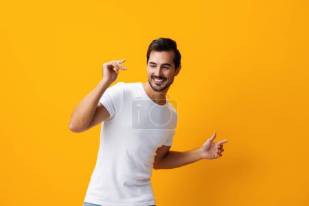 Photo for Yellow man clothing isolated design model blank white smile t-shirt shirt lifestyle studio mockup clothes space view jeans front background fashion template casual cheerful portrait casual copy - Royalty Free Image
