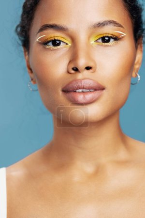 Photo for Woman happy studio cosmetic smile headshot beautiful skin shot studio face beauty lifestyle happiness american blue fashion copy make-up hair cute skin space african care curly close-up woman portrait - Royalty Free Image