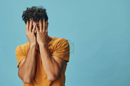 Photo for Men sad problem person expression stress head pain adult unhappy frustration desperate upset face portrait despair depressed sadness hand stressed grief emotion caucasian worried - Royalty Free Image
