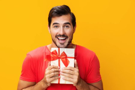 Photo for Man celebrate isolated space holding celebration happy christmas box male surprise fashion gift valentine box gift give copy present birthday guy party model holiday sale studio - Royalty Free Image