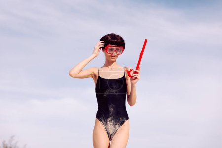Photo for Joyful Woman Smiling in Red Snorkeling Fashion: Portrait of a Happy Woman in Swimsuit enjoying a Tropical Vacation at the Beach - Royalty Free Image