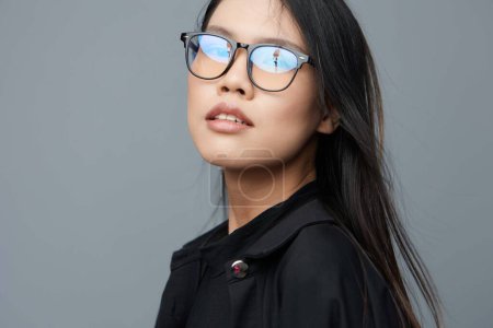 Photo for Woman business trendy happy beautiful girl background studio asian cute cheerful confident attractive smile face portrait beauty joyful lifestyle fashion student teacher glasses - Royalty Free Image