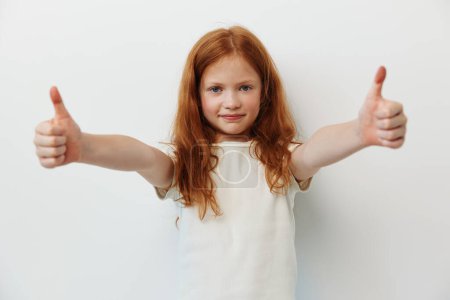 Photo for Portrait cute fun adorable beauty face happy female person joyful girl cheerful young smile children funny background kid caucasian childhood gesture small little hair - Royalty Free Image