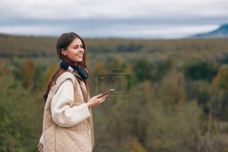 Photo for Mountain Girl: Smile of Freedom in Nature - Royalty Free Image