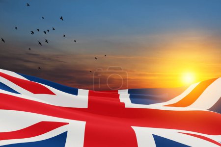 Photo for National flags of United Kingdom with flying birds on sunset sky background. Background with place for your text. 3d rendering. - Royalty Free Image