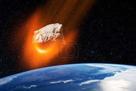 Planet Earth and big asteroid in the space. Potentially hazardous asteroids. Asteroid in outer space near Earth planet. Elements of this image furnished by NASA.
