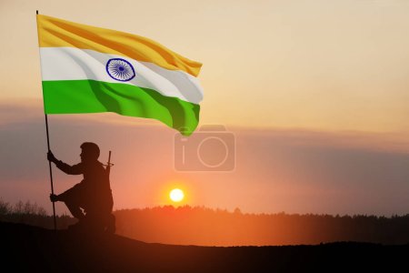 Photo for Silhouette of soldier with India flag on a background the sunset or the sunrise. Greeting card for Independence day, Republic Day. India celebration. - Royalty Free Image