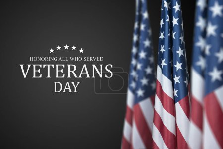 Photo for American flags with Text Veterans Day Honoring All Who Served on black background. American holiday banner. - Royalty Free Image