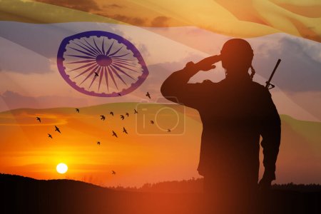 Photo for Silhouette of soldier saluting on a background of India flag and the sunset or the sunrise. Greeting card for Independence day, Republic Day. India celebration. - Royalty Free Image