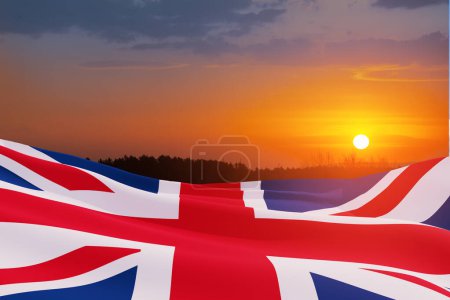 Téléchargez les photos : Drapeaux nationaux du Royaume-Uni sur fond de ciel couchant. Contexte avec place pour votre texte. Rendu 3d. - en image libre de droit