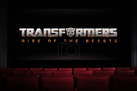 Photo for TV screen playing Transformers Rise of the Beasts trailer or movie. TV on black textured wall. Astana, Kazakhstan - May 15, 2023. - Royalty Free Image