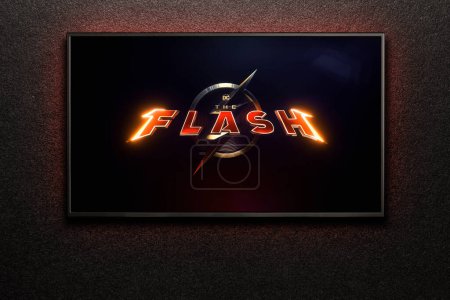 Photo for TV screen playing The Flash trailer or movie. TV on black textured wall. Astana, Kazakhstan - May 15, 2023. - Royalty Free Image