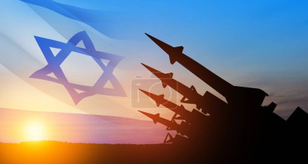 Photo for The missiles are aimed at the sky at sunset with Israel flag. Nuclear bomb, chemical weapons, missile defense, a system of salvo fire. - Royalty Free Image