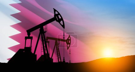 Photo for Oil drilling derricks at desert oilfield with Qatar flag. The change in oil prices caused by the war. Oil prices are rising because of the global crisis. Crude oil production from the ground. - Royalty Free Image