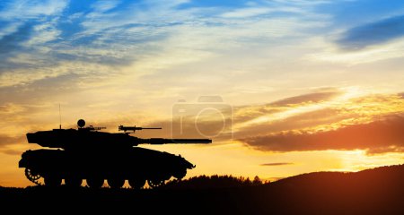 Photo for Silhouette of army tank at sunset sky background. Military machinery. - Royalty Free Image