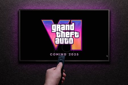 Photo for Grand Theft Auto 6 trailer game on TV screen. Man turns on TV with remote control. Astana, Kazakhstan - December 5, 2023. - Royalty Free Image