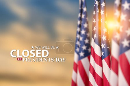 Photo for Presidents Day Background Design. American flags on a background of orange sky at sunset with a message. We will be Closed on Presidents Day. - Royalty Free Image