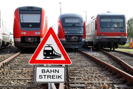 Photo for Strike at the German Federal Railways. Rail strike sign, rails and trains - Royalty Free Image