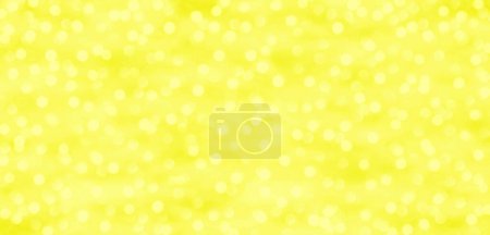 Yellow and gold background with dots of light
