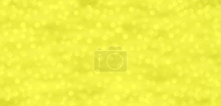 Yellow and gold background with dots of light