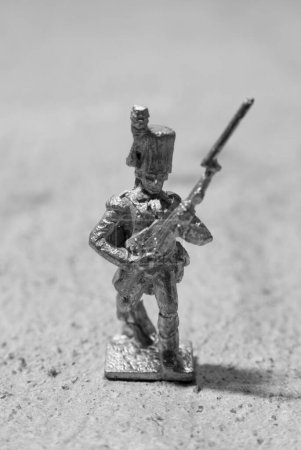 figurine of an antique lead toy soldier 