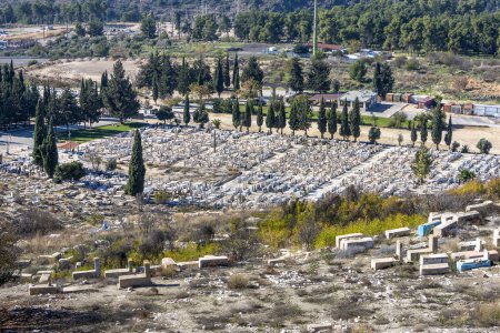 Photo for View of old jewish cemetery, the graves of the righteous are painted blue, Safed, Upper Galilee, Israel - Royalty Free Image