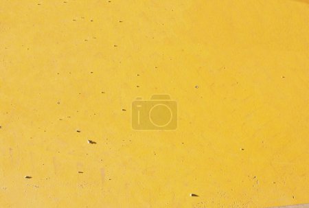 Foto de Vista superior de fondo texturizado de color amarillo brillante con superficie lisa - Imagen libre de derechos