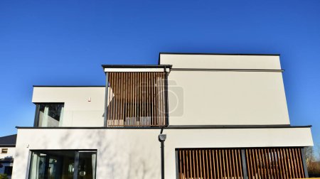 Photo for Cozy and modern house with garage and cobblestone driveway. Modern architecture. - Royalty Free Image