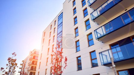 Photo for New apartment building on a sunny day. Modern residential architecture. The apartment is waiting for new residents. - Royalty Free Image
