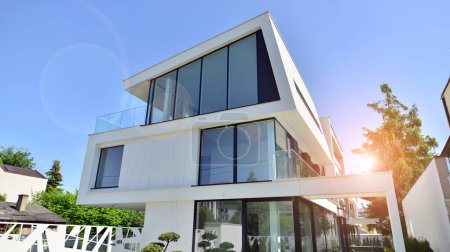Photo for Elegant white house with open concept. Modern luxury villa exterior. A modern house with large windows and glazing. - Royalty Free Image