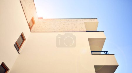 New contemporary residential construction architecture background. Modern house facade exterior.
