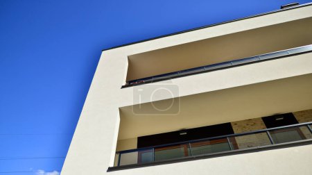 New contemporary residential construction architecture background. Modern house facade exterior.