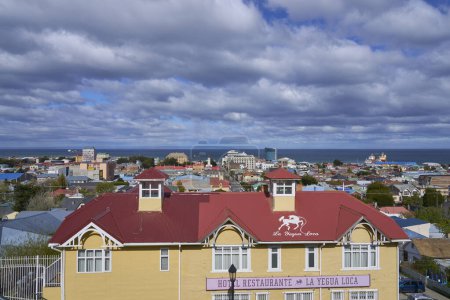 Photo for Punta Arenas, Chile - October 30, 2022: Colourfully painted buildings in the historic city of Punta Arenas in. southern Chile - Royalty Free Image