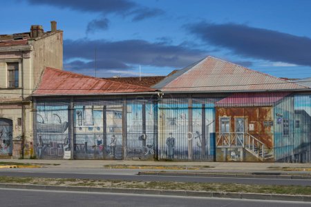 Photo for Punta Arenas, Chile - October 31, 2022: Historic buildings decorated with murals along the waterfront of Punta Arenas - Royalty Free Image