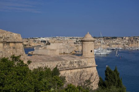 Photo for Valetta, Malta - June 8, 2023: Scenic view from the city of Valetta across the Grand Harbour to Birgu and Senglea - Royalty Free Image