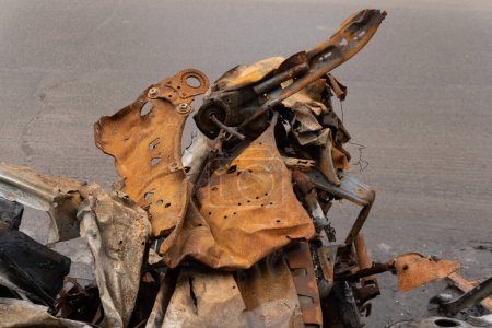 Burnt car metal, scrap metal, close-up.