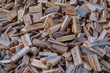 Foto de Close up of sawn wood pieces stacked for use as fuel - Imagen libre de derechos
