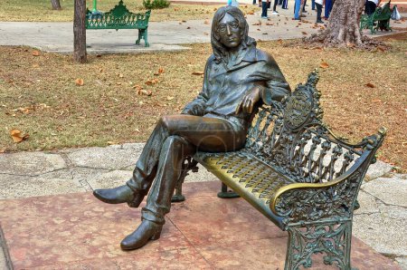 Photo for Havana, Cuba, February 3, 2010:  Statue of John Lennon in John Lennon Park, a popular park attracting many tourists every day, Lennon is revered in Cuba. - Royalty Free Image