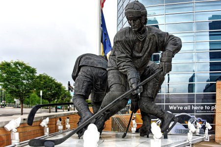 Photo for Le Magnifique the bronze statue of Mario Lemieux outside the PPG Pittsburgh Paints arena. It was sculpted by Bruce Wolfe and depicts him breaking past two defensemen. buy the Penguins and became first player-owner of a team in the modern era. - Royalty Free Image