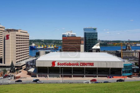 Photo for Halifax, Canada - August 2, 2023: View of Halifax including Scotiabank Centre arena, home of the Mooseheads of the Quebec Major Junior Hockey League, Scotiabank, CIBC and TD buildings. The GPO Heavy Lift vessel can be seen in Halifax Harbour. - Royalty Free Image