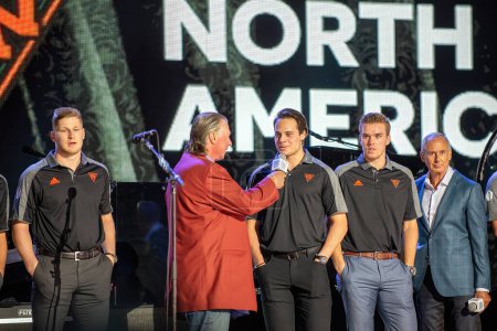 Photo for Toronto, Canada  September 16, 2016  Barry Melrose interviews Auston Matthews as Nathan MacKinnon, L, and Connor McDavid of Team North America, the under 23 team at the World Cup of Hockey premiere party, stand by. Ron MacLean is seen on the righ - Royalty Free Image