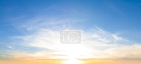 Photo for Evening sun on blue cloudy sky at the evening, dramatic sunset background - Royalty Free Image