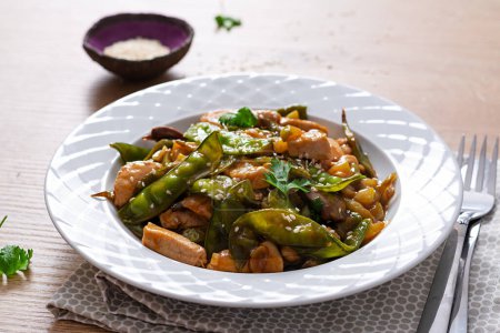 Photo for Stir fry chicken, green peas and green beans.. Asian style - Royalty Free Image