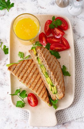 Photo for Vegan sandwich with cheese and avocado. Vegetarian breakfast. Top view, flat lay - Royalty Free Image