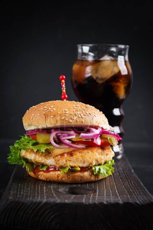 Photo for Chicken hamburger. Sandwich with chicken burger, tomatoes, cheese and lettuce. Cheeseburger. - Royalty Free Image