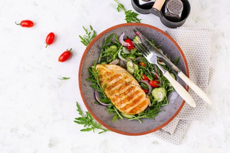 Photo for Grilled chicken fillet and fresh salad. Healthy lunch menu. Keto food. Top view - Royalty Free Image
