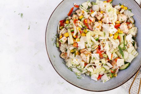 Photo for Chinese cabbage salad with chicken meat, corn, cucumber and dressing mustard. Asian food. Top view - Royalty Free Image