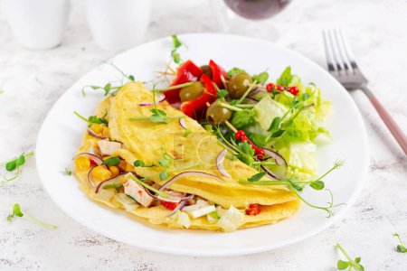 Photo for Healthy breakfast.Quesadilla with omelette, chicken fillet, corn and fresh salad. Keto, ketogenic lunch. - Royalty Free Image